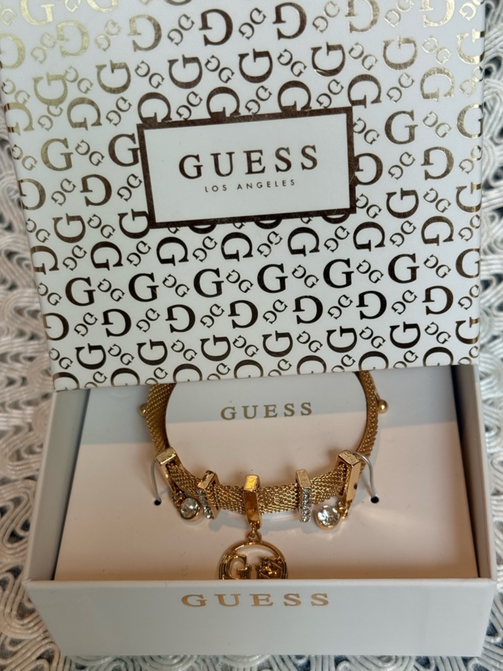 GUESS Gold Charm Bracelet with Crystal Accents